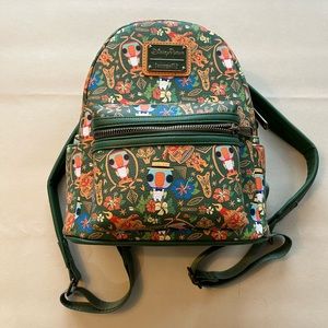 Disney Parks Tiki Room Loungefly mini backpack.